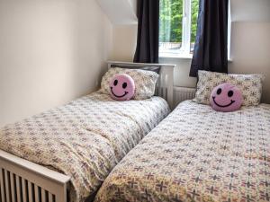 Postel nebo postele na pokoji v ubytování Faith Cottage + 17 fotografií