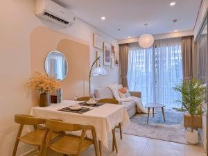 Et opholdsområde på The Sóng Hotel - Căn Hộ Dịch Vụ Cao Cấp