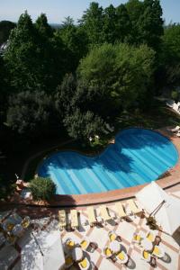 The swimming pool at or close to Grand Hotel Bellavista Palace & Golf