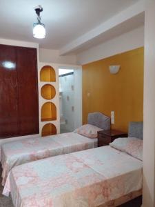 En eller flere senge i et værelse på Enjoy Ghardaia Stay