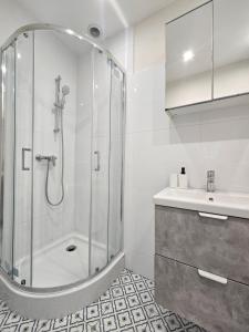 Ένα μπάνιο στο Apartamenty KDN Metalowców