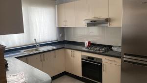 Kuchyň nebo kuchyňský kout v ubytování ADAN beach Aourir