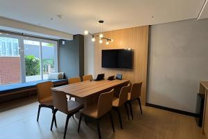 TV a/nebo společenská místnost v ubytování Studio Confort Proximo Allianz