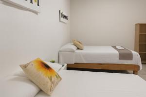 Postel nebo postele na pokoji v ubytování Hospedaje Aldana - Posada SOL en zona natural