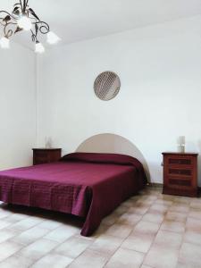 Giường trong phòng chung tại Appartamento Mancaversa Centro, 200m mare