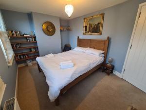 Postel nebo postele na pokoji v ubytování 5 Exe Street-Pretty 3 bed townhouse-sleeps 4