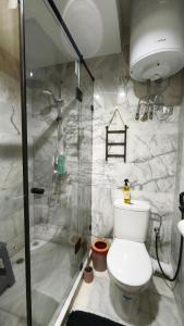 Ένα μπάνιο στο Appartement Chaleureux à Bouznika- Plage Oued Cherrat - à 30min de Rabat 1chambre 1 salon