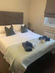 Giường trong phòng chung tại Ardeonaig Rock