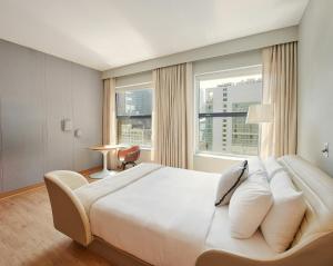 Ένα ή περισσότερα κρεβάτια σε δωμάτιο στο Sports Illustrated Resorts Chicago