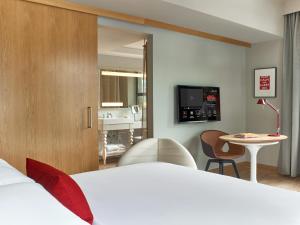 Ένα ή περισσότερα κρεβάτια σε δωμάτιο στο Sports Illustrated Resorts Chicago