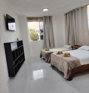 Postel nebo postele na pokoji v ubytování Darwin-Galápagos Apartment