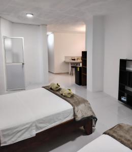 Postel nebo postele na pokoji v ubytování Darwin-Galápagos Apartment + 5 fotografií