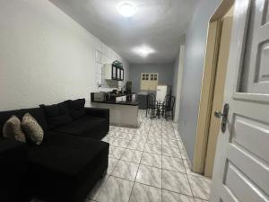 Et opholdsområde på Apartamento 2 quartos excelente localização + 9 billeder