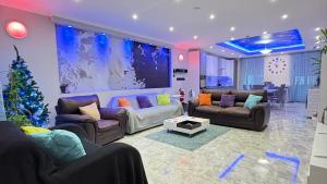 Un lugar para sentarse en Azure Apartment