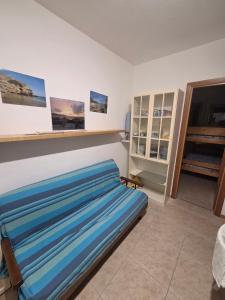 En eller flere senge i et værelse på Casa vacanze il tramonto vasto marina