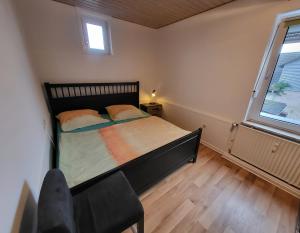 Postel nebo postele na pokoji v ubytování Ferienwohnungen Hofmann