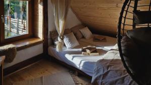 Postel nebo postele na pokoji v ubytování Kuća od slame PANONSKI MORNAR