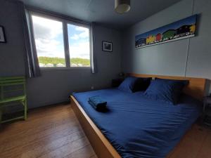 Ένα ή περισσότερα κρεβάτια σε δωμάτιο στο Chambre en Seine chez Philippe +25 φωτογραφίες