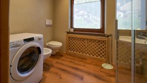 Koupelna v ubytování Sappada Family Apartments + 103 fotografií