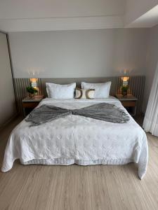 Ένα ή περισσότερα κρεβάτια σε δωμάτιο στο Tropical hotel Suíte Realeza