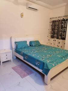 Giường trong phòng chung tại Maison de rêve