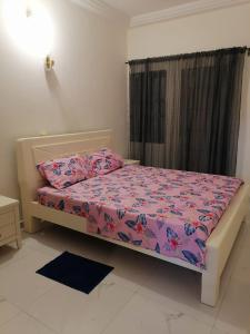 Giường trong phòng chung tại Maison de rêve