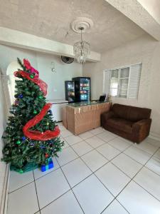 TV a/nebo společenská místnost v ubytování Pousada Estilo Brasil