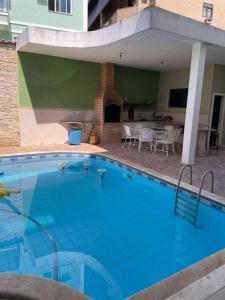 Πισίνα στο ή κοντά στο Casa a 3 minutos na praia do forte