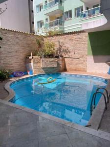 Πισίνα στο ή κοντά στο Casa a 3 minutos na praia do forte