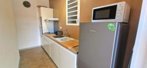 Kuchyň nebo kuchyňský kout v ubytování Ti Ker Créole + 4 fotografie