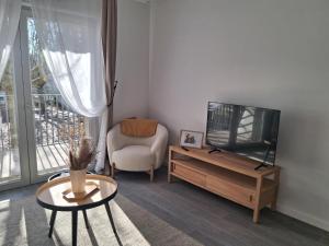 Et tv og/eller underholdning på Résidence Domitys Les Cristaux