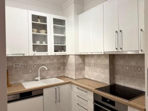 Η κουζίνα ή μικρή κουζίνα στο Pionir stan +1 φωτογραφίες