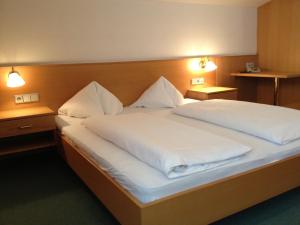 Postel nebo postele na pokoji v ubytování Appartement Resort Hanneshof