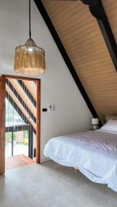 Giường trong phòng chung tại Zer House