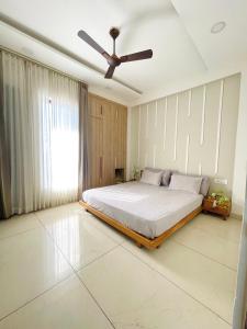 En eller flere senge i et værelse på Nook By The Valley