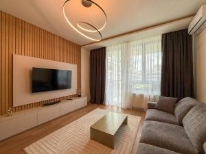 TV a/nebo společenská místnost v ubytování BW Crown Garden Residences