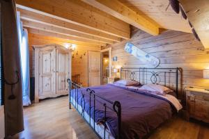 Ένα ή περισσότερα κρεβάτια σε δωμάτιο στο Chalet Le Hors Piste