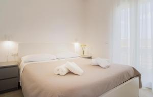 En eller flere senge i et værelse på Stunning Apartment In Marzamemi With Wifi