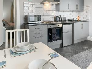 Køkken eller tekøkken på Rose - Uk49363