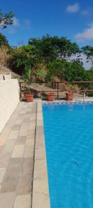 Bazén v ubytování Recanto Doce Lar nebo v jeho okolí + 28 fotografií