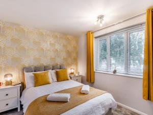 Ένα ή περισσότερα κρεβάτια σε δωμάτιο στο Strawberries And Cream +11 φωτογραφίες