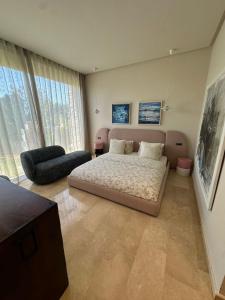 En eller flere senge i et værelse på Villa Golf Bahia Beach + 16 billeder