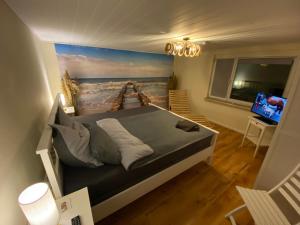 Postel nebo postele na pokoji v ubytování Ferienhaus am Wald