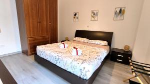 En eller flere senge i et værelse på La Fontana di Norcia