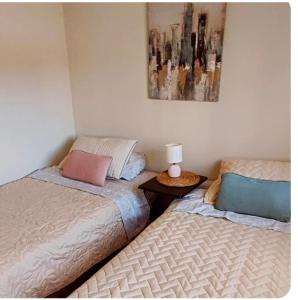 En eller flere senge i et værelse på El refugio