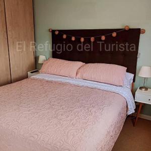 En eller flere senge i et værelse på El refugio