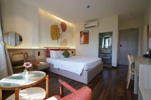 En eller flere senge i et værelse på Nicecy Daily - Bến Thành Market