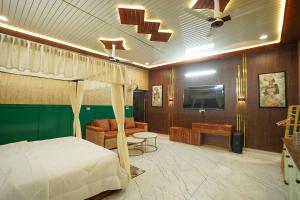 TV a/nebo společenská místnost v ubytování Baani Villa