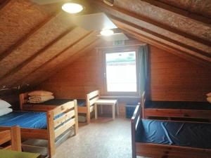Giường trong phòng chung tại NabeDi-Blockhaus