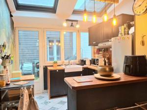 Køkken eller tekøkken på La Fabrique Du Centre - Cœur De Ville